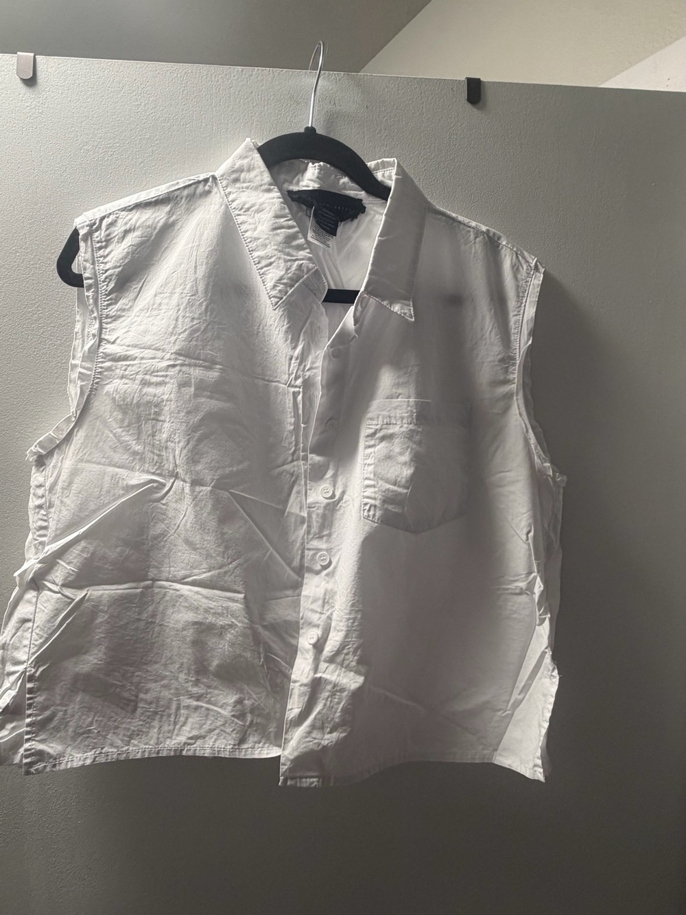 know.one.cares White Sleeveless Button-Up Top